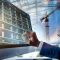 person-is-using-computer-explaining-building-construction-others-background_1204564-6972